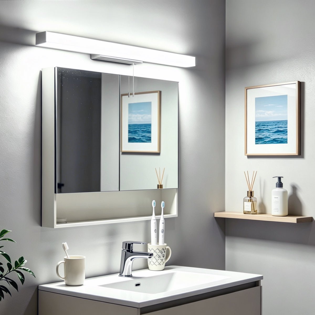 Modern bathroom mirror light mounted above vanity unit