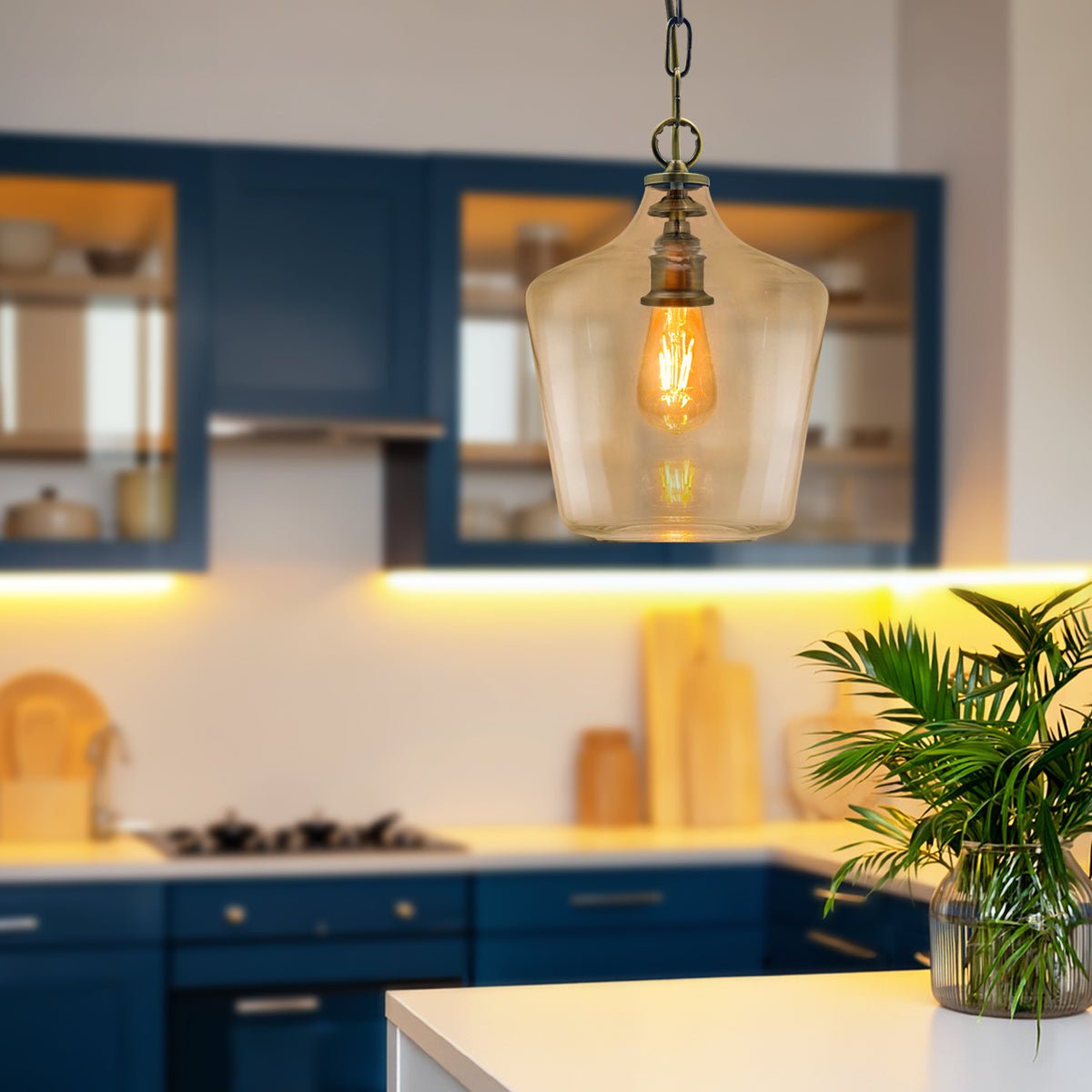Antique brass ceiling pendant with a clear glass shade for vintage, industrial and modern interiors