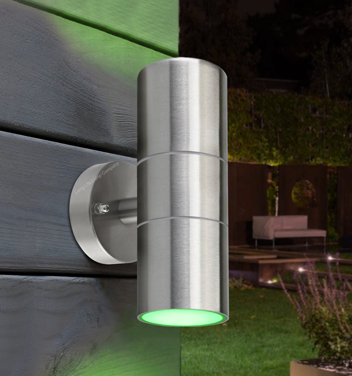 Cylindrical twin LED wall light with coloured beams and IP65 weatherproof outdoor construction